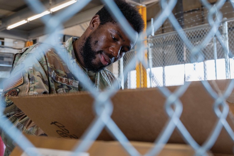 Air Force Senior Airman Uchenna Ekwueme, 635th Materiel Maintenance Support Squadron cargo movement technician, processes inboundshipment at Holloman Air Force Base, New Mexico, September 18, 2024 (U.S. Air Force/Nicholas Paczkowski)